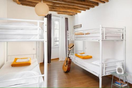 Habitación Familiar del hotel Le Village Montmartre by Hiphophostels. Foto 1
