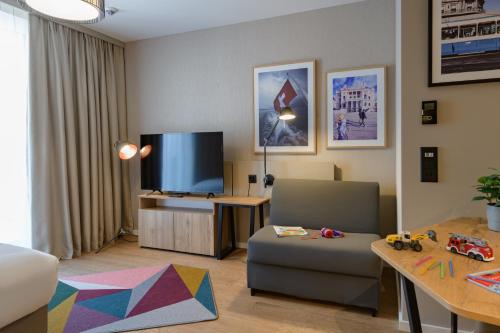 Estudio con 2 camas individuales del hotel Adagio Zurich Center. Foto 7