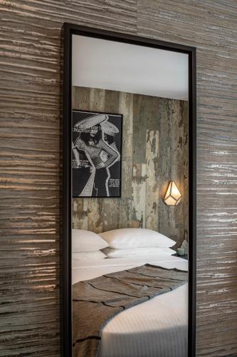 Habitación Superior Esquinera - 1 cama grande del hotel The FIDI. Foto 5