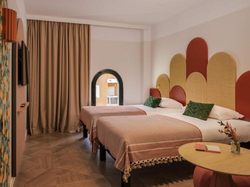 Habitación Doble Estándar - 2 camas del hotel Ibis Styles Sevilla Santa Justa. Foto 3