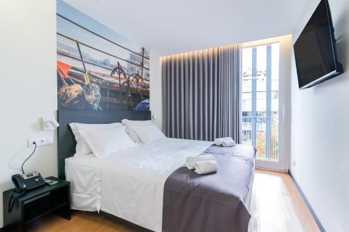 Habitación Doble Deluxe con Balcón del hotel Flag Design. Foto 1