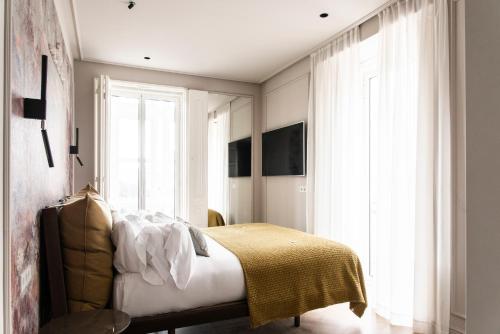 Habitación Doble Superior - 1 o 2 camas del hotel Soho Boutique Palacio de Pombo. Foto 3