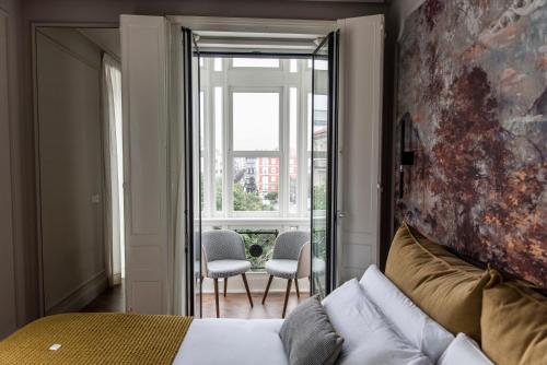 Habitación Doble Superior - 1 o 2 camas del hotel Soho Boutique Palacio de Pombo. Foto 4