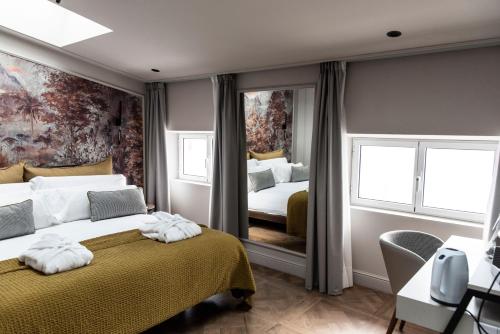 Suite del hotel Soho Boutique Palacio de Pombo
