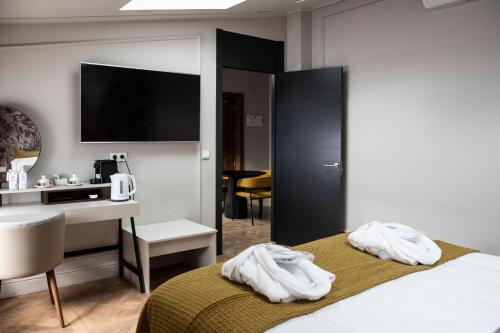 Suite del hotel Soho Boutique Palacio de Pombo. Foto 1