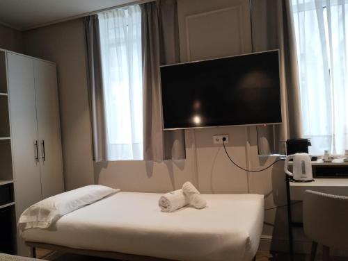 Habitación Triple del hotel Soho Boutique Palacio de Pombo. Foto 4