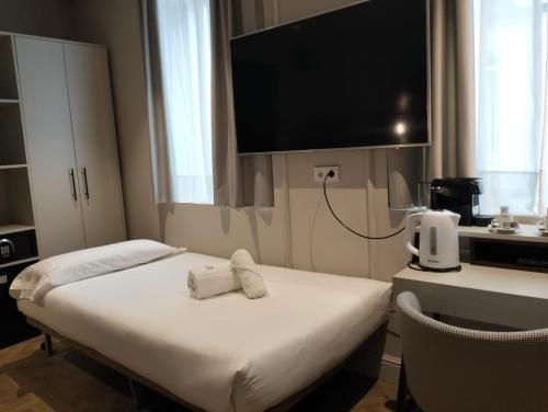 Habitación Triple del hotel Soho Boutique Palacio de Pombo. Foto 5