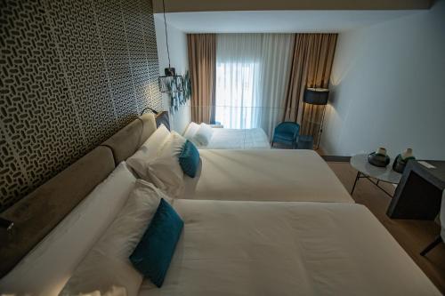 Habitación Triple del hotel Soho Boutique Catedral. Foto 5