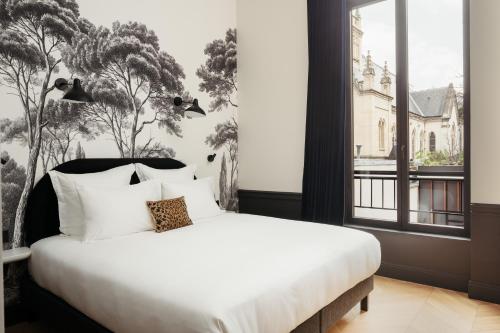 Apartamento de 1 dormitorio con vistas al jardín del hotel My Maison In Paris - Invalides. Foto 10