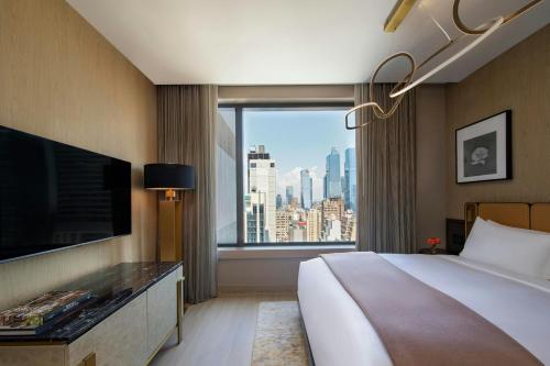 Habitación Hudson con cama extragrande - Planta superior/nivel Club del hotel The Ritz-Carlton New York, NoMad. Foto 1