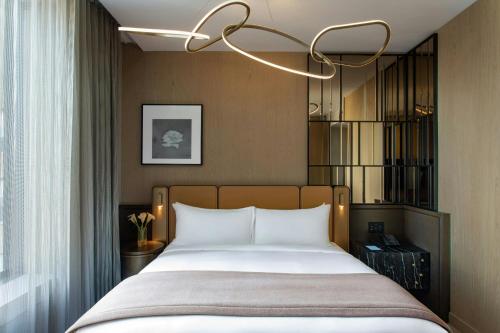 Habitación Hudson con cama extragrande - Planta alta del hotel The Ritz-Carlton New York, NoMad. Foto 3