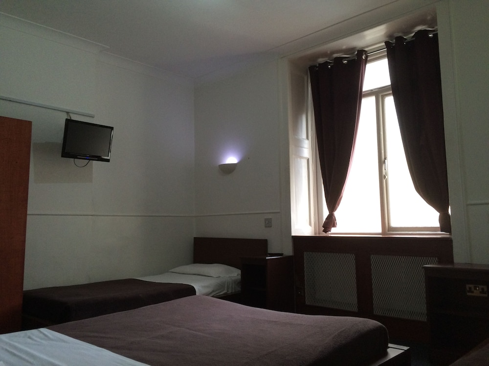 Habitación cuádruple estándar, 1 habitación del hotel London Continental. Foto 3
