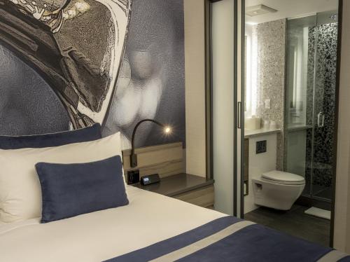 Habitación Superior con cama extragrande del hotel Carnegie. Foto 14