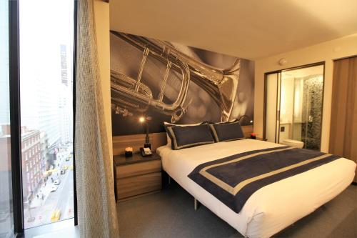 Habitación Superior con cama extragrande del hotel Carnegie. Foto 5