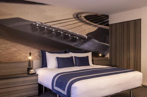 Suite Junior Superior con cama extragrande del hotel Carnegie. Foto 11