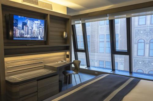 Suite Junior Superior con cama grande del hotel Carnegie