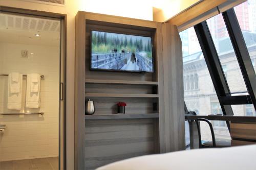 Suite Junior Superior con cama grande del hotel Carnegie. Foto 7