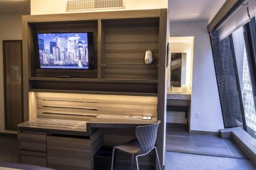 Suite Junior Superior con cama grande del hotel Carnegie. Foto 14