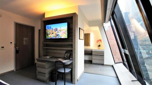 Suite Junior Superior con cama grande del hotel Carnegie. Foto 9