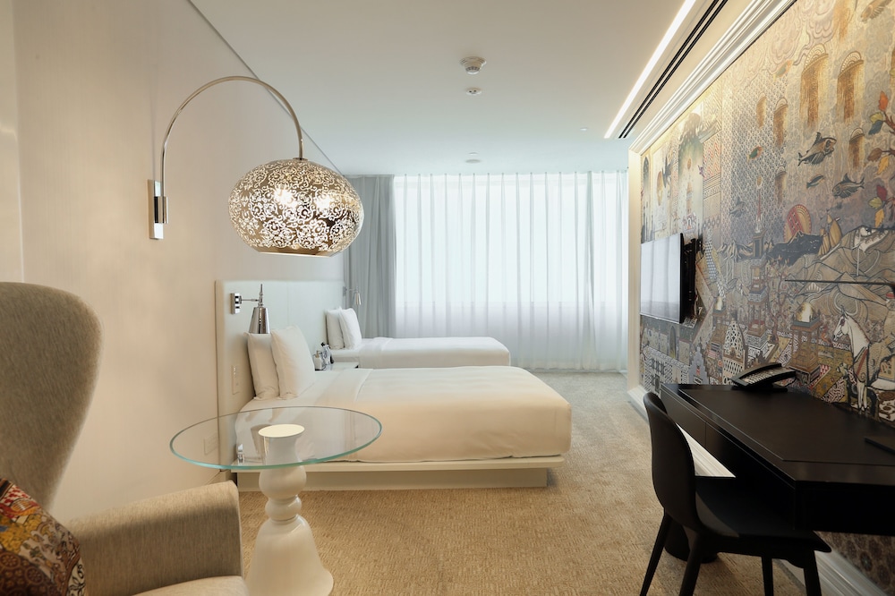 Habitación Signature con 2 camas dobles del hotel Mondrian Doha. Foto 1
