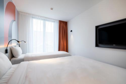 Habitación Triple del hotel B&B Gent Centrum. Foto 1