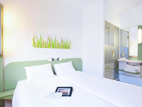 Habitación Doble - 2 camas del hotel Ibis Budget Bilbao Barakaldo. Foto 3