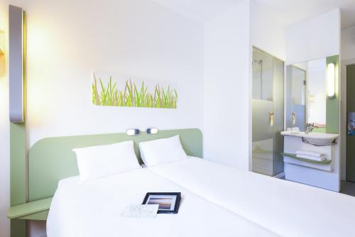 Habitación Doble - 2 camas del hotel Ibis Budget Bilbao Barakaldo. Foto 13