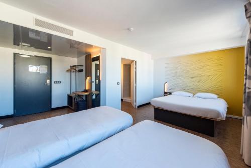 Habitación Cuádruple del hotel B&B Nice Aéroport Arenas. Foto 13