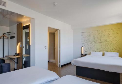 Habitación Cuádruple del hotel B&B Nice Aéroport Arenas. Foto 14