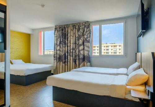 Habitación Cuádruple del hotel B&B Nice Aéroport Arenas. Foto 15