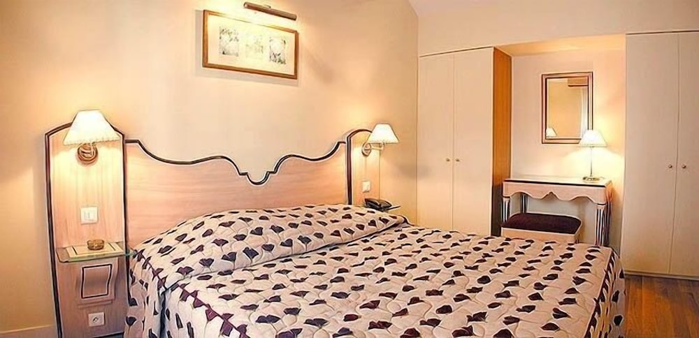 Habitación Cuádruple del hotel Suites Unic Renoir Saint-Germain
