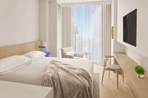 Habitación Premier con cama extragrande y vistas a Times Square - Adaptada para personas con discapacidad auditiva del hotel The Times Square EDITION