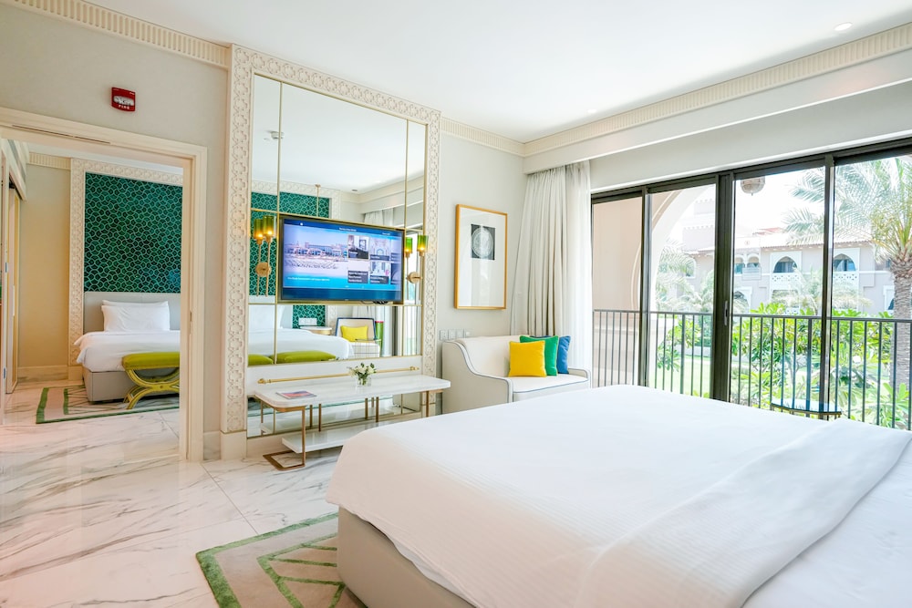 Habitación Familiar de Dos Dormitorios - Vistas al Jardín con Cama King del hotel Rixos Premium Saadiyat Island. Foto 1