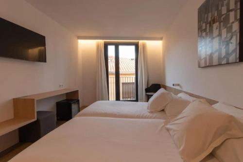 Habitación Triple del hotel Cortabitarte. Foto 2