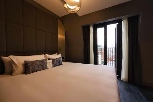 Habitación cómoda con balcón del hotel AMANO Covent Garden. Foto 13