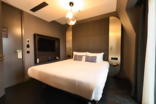 Habitación cómoda con balcón del hotel AMANO Covent Garden. Foto 14