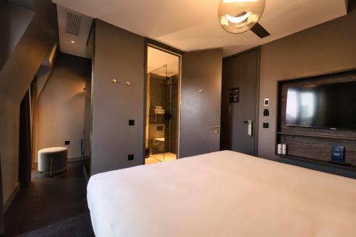 Habitación cómoda con balcón del hotel AMANO Covent Garden. Foto 15