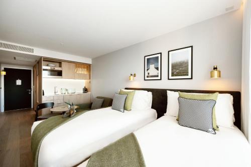 Estudio Doble con 2 camas individuales del hotel Wilde s, London, Paddington. Foto 1