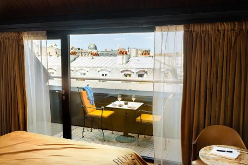 Habitación Doble Deluxe con terraza del hotel Madame Rêve. Foto 2