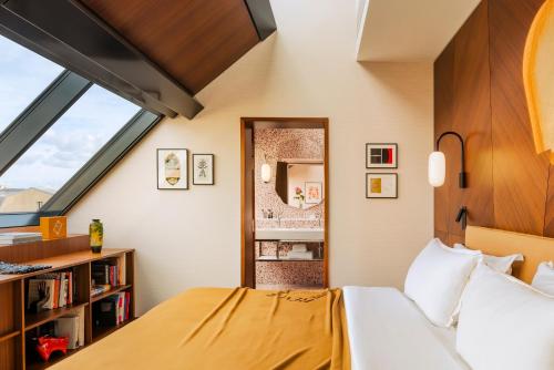 Suite con vistas a los tejados de París - Atelier del hotel Madame Rêve. Foto 3