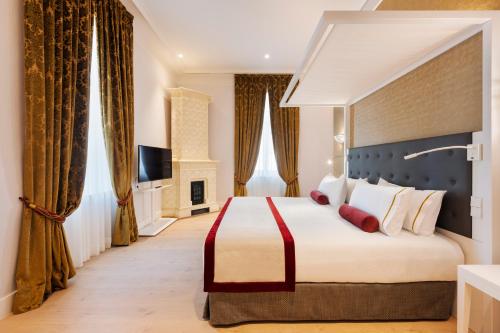 Suite con cama grande del hotel Aurea Ana Palace By Eurostars Company. Foto 7