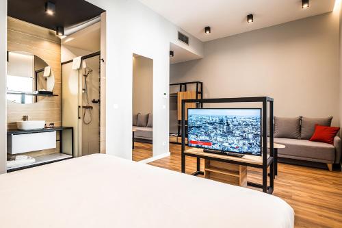 Habitación Superior con sofá del hotel Up Budapest. Foto 7
