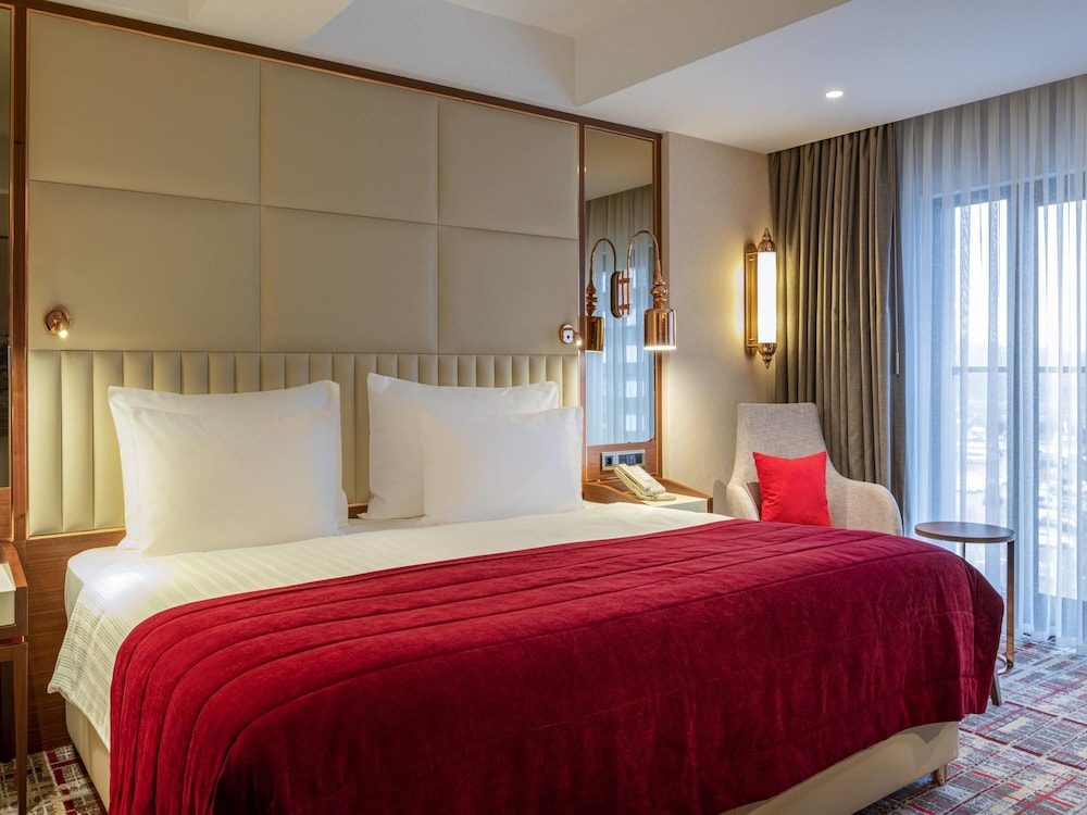 Habitación Superior Twin Conectada del hotel Mövenpick Istanbul Asia Airport. Foto 1