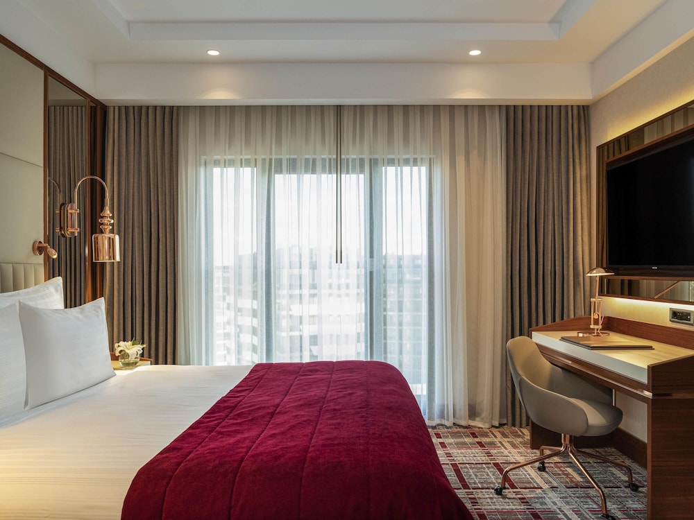 Habitación Superior King Conectada del hotel Mövenpick Istanbul Asia Airport. Foto 1