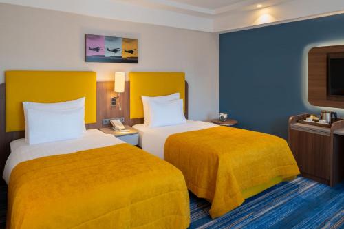 Habitación Clásica Twin Conectada del hotel Mövenpick Istanbul Asia Airport. Foto 5