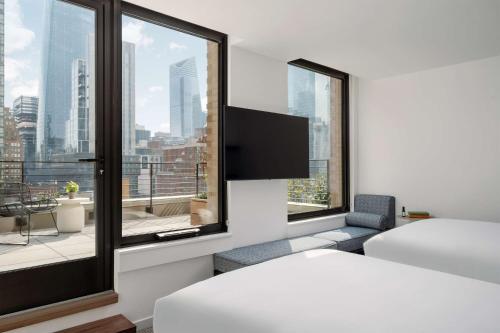Habitación Terrace con 2 camas dobles del hotel Arlo Midtown