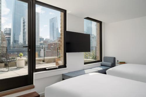 Habitación Terrace con 2 camas dobles del hotel Arlo Midtown. Foto 5
