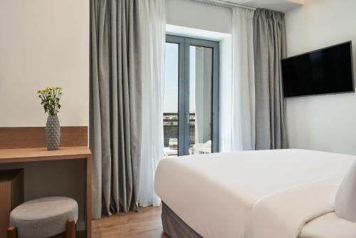 Habitación Deluxe con porche del hotel NLH KERAMEIKOS - Neighborhood Lifestyle Hotels