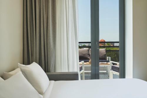 Suite Executive con porche del hotel NLH KERAMEIKOS - Neighborhood Lifestyle Hotels. Foto 1