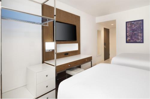 Habitación Doble con 2 camas dobles - No fumadores del hotel Best Western Premier Empire State. Foto 3